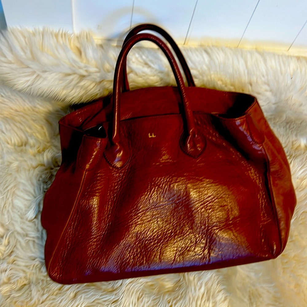 Mark & Graham
Brown leather 14x10x7
